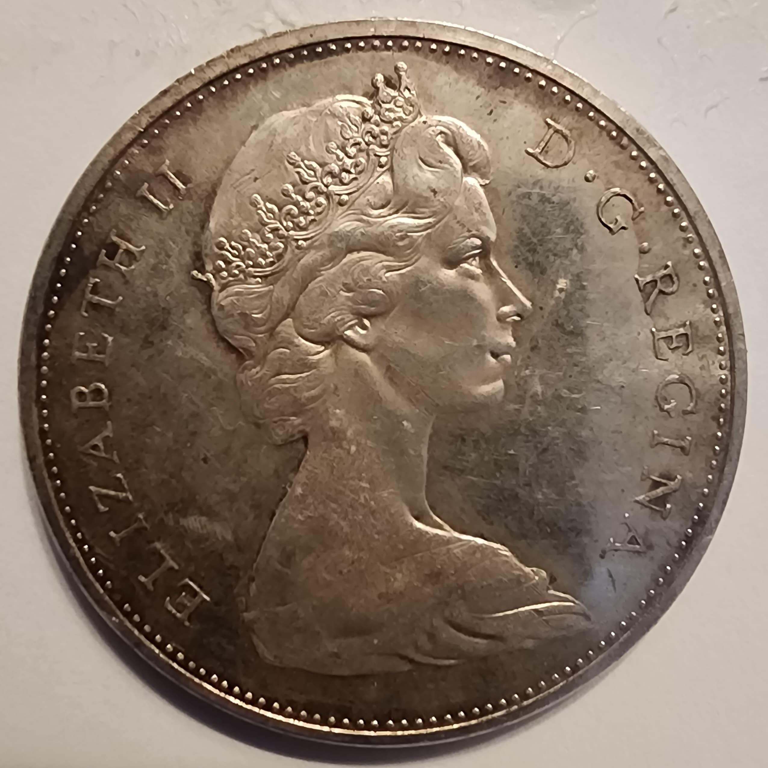 canada-not-specified-for-this-particular-coin-in-metadata-the-voyageur-dollar-with-queen-elizabeth-ii-was-minted-from-1953-to-1986-the-silver-coins-of-canada-category-suggests-it-is-from-the-silver-issues-1953-1967-item